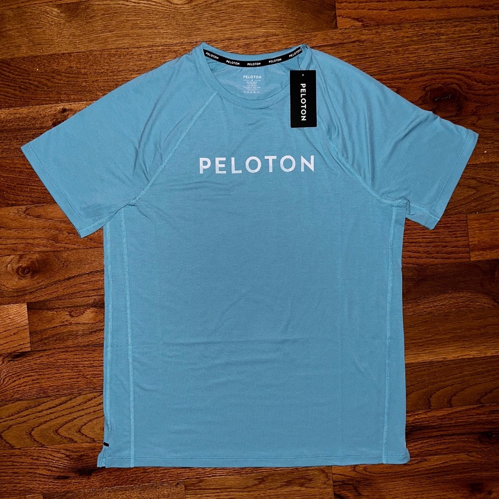 Peloton Men's blue tech short sleeve relaxed fit T-shirt.